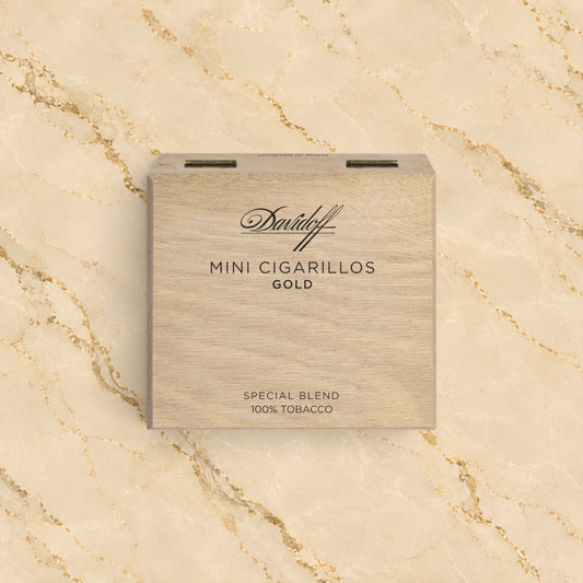 Arcadia Cigars Church Street Davidoff Mini Cigarillos Gold wooden box on a marble surface